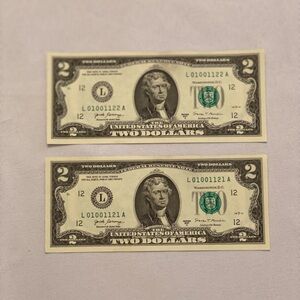 Two Dollar Bills with Green Seal